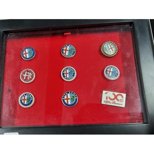 55 - A cased set of 9 Alpha Romeo enamelled pin badges, a very rare and expensive set to purchase when ne... 