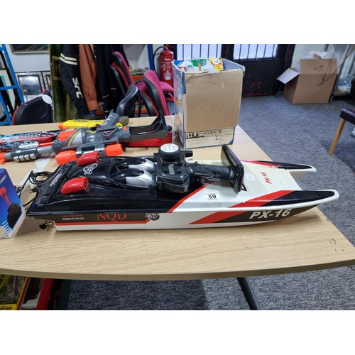 59 - A large plastic remote control boat, model NQD 757 PX-16, complete with its remote control and in go... 