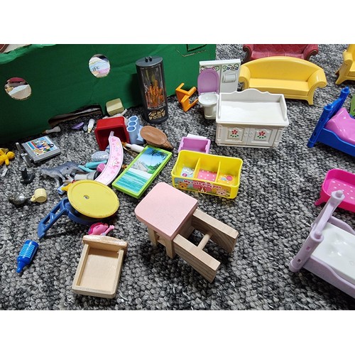 61 - A large collection of dolls house furniture mostly by Playmobil.