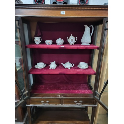 319 - Edwardian mahogany display cabinet in the Sheraton manner, with fruitwood string inlay, 2 doors to t... 