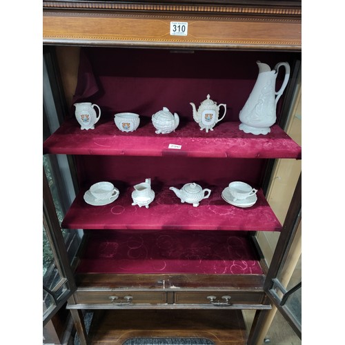 319 - Edwardian mahogany display cabinet in the Sheraton manner, with fruitwood string inlay, 2 doors to t... 