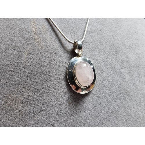 170 - 925 silver pendant with a large rose quartz cabochon stone on 20