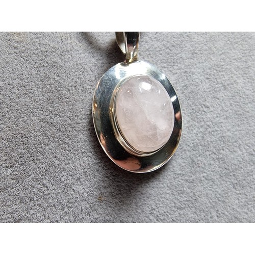 170 - 925 silver pendant with a large rose quartz cabochon stone on 20