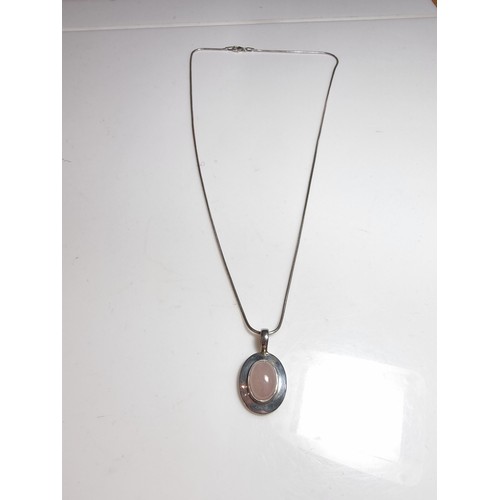 170 - 925 silver pendant with a large rose quartz cabochon stone on 20