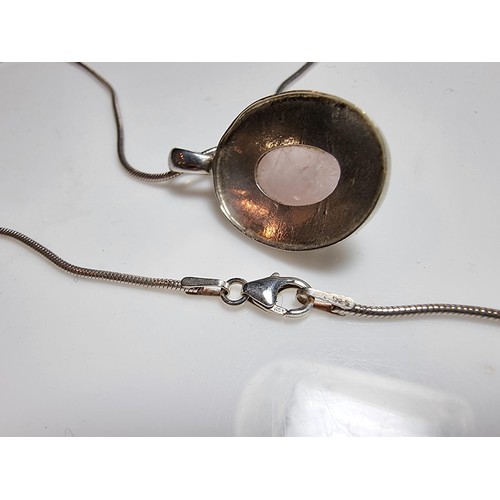 170 - 925 silver pendant with a large rose quartz cabochon stone on 20