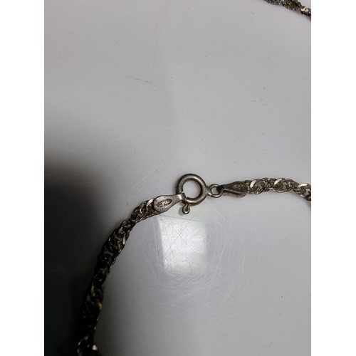 171 - 925 silver three strand neck chain along with a similar 925 silver bracelet. All in good order. Boxe... 