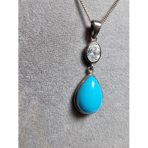 172 - Pretty 925 silver pendant inset with a turquoise stone & CZ crystal stone, on 18