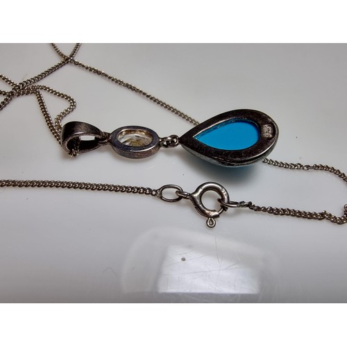 172 - Pretty 925 silver pendant inset with a turquoise stone & CZ crystal stone, on 18