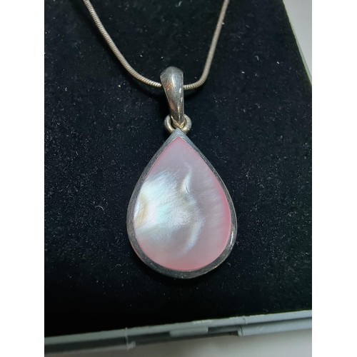 188 - 925 silver teardrop pendant inset with pink Mother of Pearl on 18