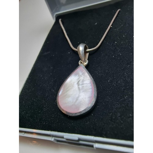 188 - 925 silver teardrop pendant inset with pink Mother of Pearl on 18