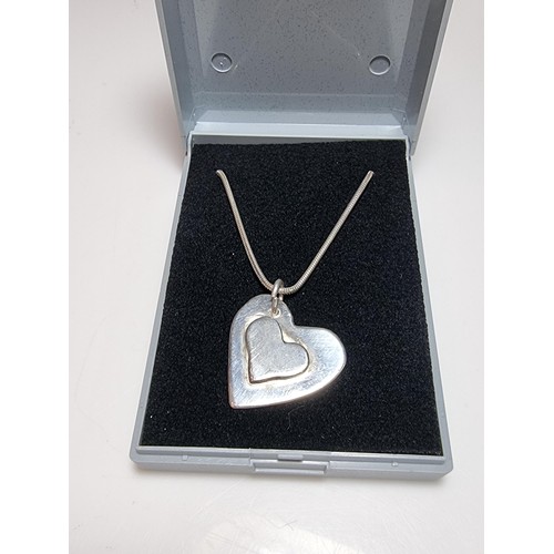 189 - Chunky 925 silver heart pendant set on 18