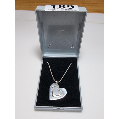 189 - Chunky 925 silver heart pendant set on 18