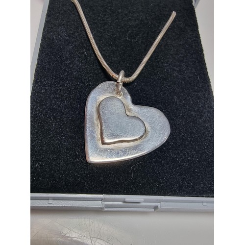 189 - Chunky 925 silver heart pendant set on 18