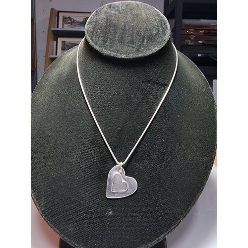 189 - Chunky 925 silver heart pendant set on 18