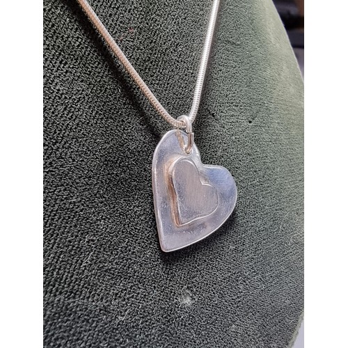 189 - Chunky 925 silver heart pendant set on 18