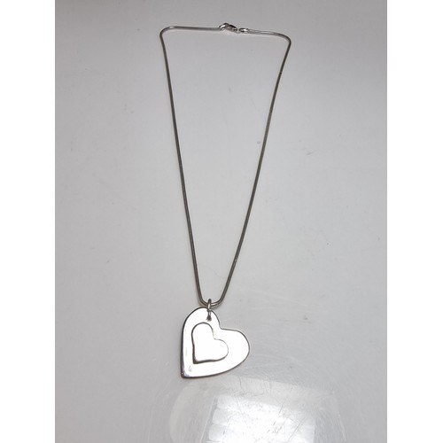 189 - Chunky 925 silver heart pendant set on 18