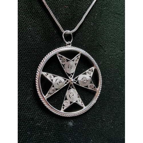 192 - Large 925 silver Maltese cross pendant with an intricate wire work design, on a 16