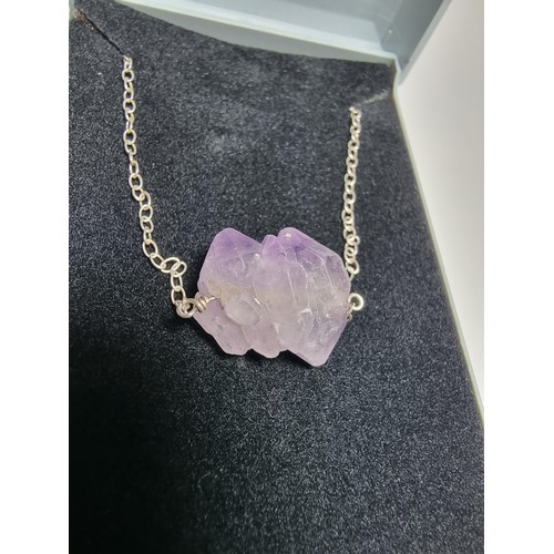 197 - Natural double terminated (pointed) Amethyst stone pendant set on 18