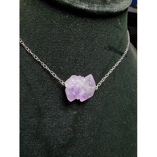 197 - Natural double terminated (pointed) Amethyst stone pendant set on 18