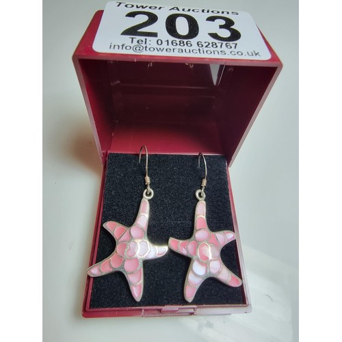 203 - Pair of pretty starfish formed drop earrings inset with pink mother of pearl. In good clean conditio... 