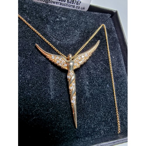 209 - Pretty yellow gold on 925 silver winged angel pendant inset with crystal CZ stones on a 20