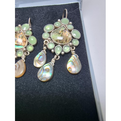 211 - Pair of ornate silver plate on copper drop earrings inset with Abalone shell and green stones, featu... 