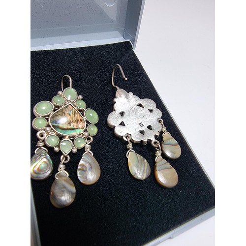 211 - Pair of ornate silver plate on copper drop earrings inset with Abalone shell and green stones, featu... 