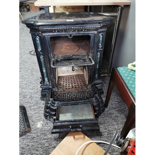 395 - Good quality French antique late Victorian cast iron enamel stove in black with green coloured decor... 