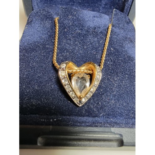 220 - Genuine Swarovski gold plated necklace featuring a heart shaped pendant inset with Swarovski crystal... 