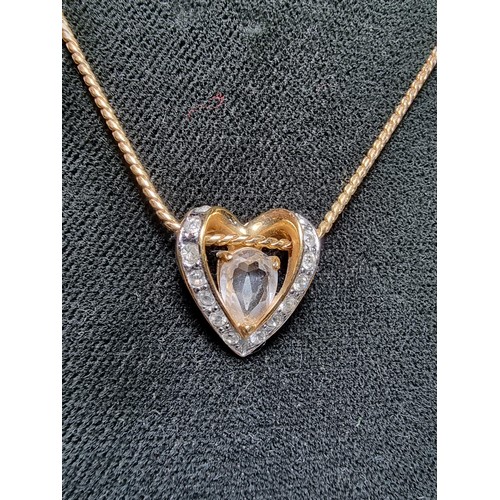 220 - Genuine Swarovski gold plated necklace featuring a heart shaped pendant inset with Swarovski crystal... 