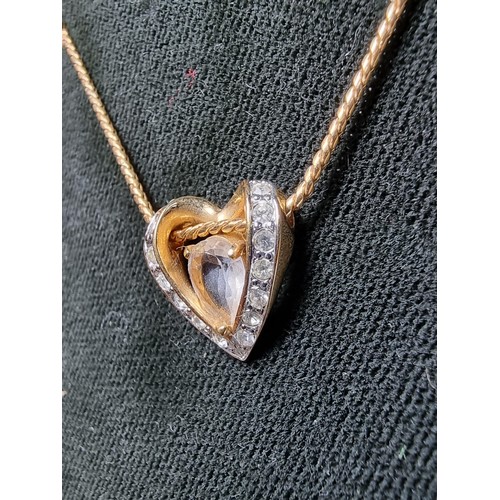 220 - Genuine Swarovski gold plated necklace featuring a heart shaped pendant inset with Swarovski crystal... 