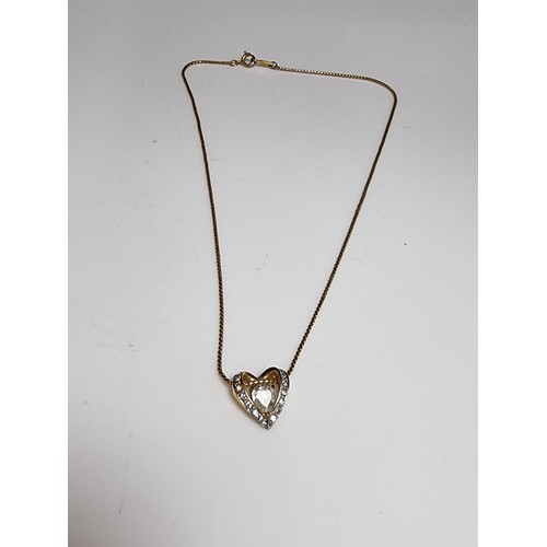 220 - Genuine Swarovski gold plated necklace featuring a heart shaped pendant inset with Swarovski crystal... 