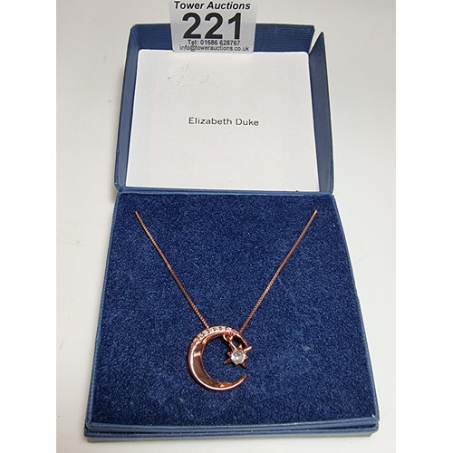 221 - Rose gold plated on solid 925 silver necklace featuring a moon pendant with a dangling star inset wi... 