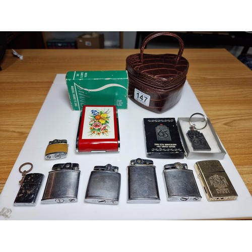 147 - Collection of 7x collectable lighters along with a boxed Zippo 65th Anniversary key ring, Dandy Mate... 