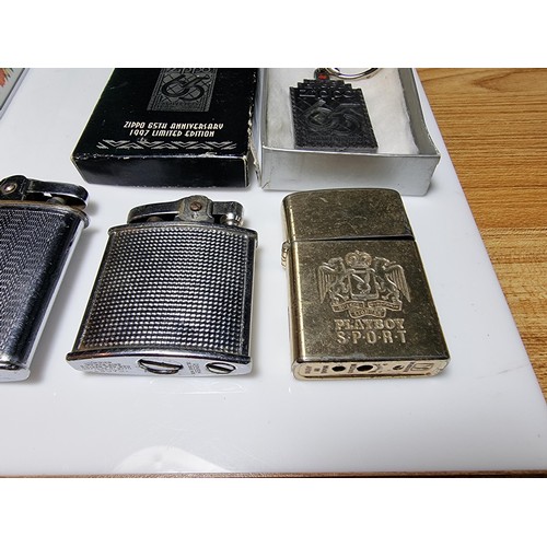 147 - Collection of 7x collectable lighters along with a boxed Zippo 65th Anniversary key ring, Dandy Mate... 