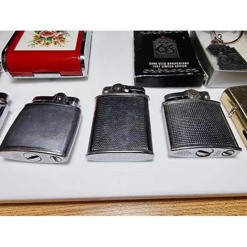 147 - Collection of 7x collectable lighters along with a boxed Zippo 65th Anniversary key ring, Dandy Mate... 