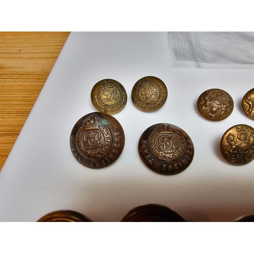 243 - Collection of approx. 33 vintage brass military buttons for various regiments. Please study photos f... 