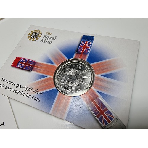 245 - Rare collectable The Royal Mint 50 Years Anniversary Mini (car) coin.