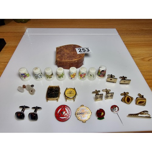 253 - Small qty of collectables to include 8x Royal Worcester thimbles, 4x pairs of cufflinks, pin badges,... 