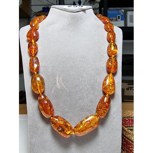 259 - Large vintage chunky natural Baltic amber beaded necklace with inclusions, hand knotted, presenting ... 