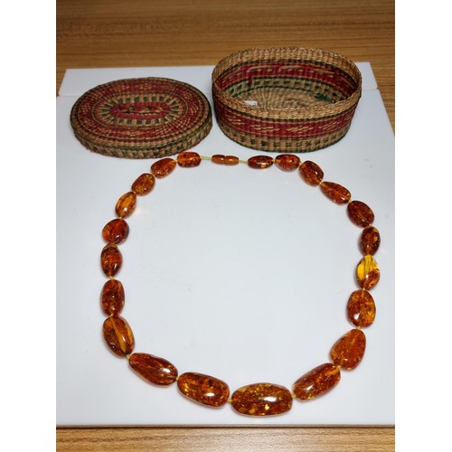 259 - Large vintage chunky natural Baltic amber beaded necklace with inclusions, hand knotted, presenting ... 