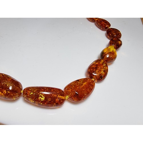 259 - Large vintage chunky natural Baltic amber beaded necklace with inclusions, hand knotted, presenting ... 