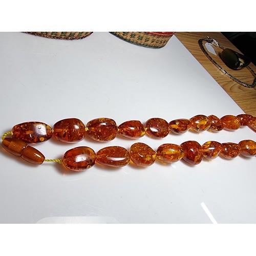 259 - Large vintage chunky natural Baltic amber beaded necklace with inclusions, hand knotted, presenting ... 