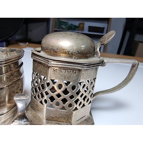 261 - Three piece hallmarked silver condiment sets to include salt pot, mustard pot & sauce pot. Two with ... 