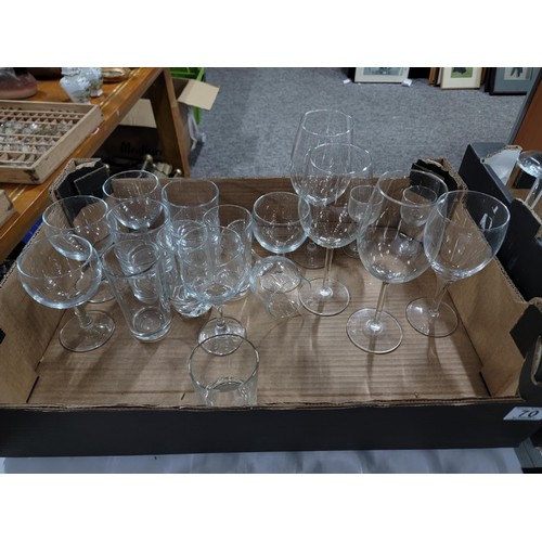 70 - 2x boxes containing a large quantity of drinking glasses inc cranberry glass sherry glasses, pint gl... 