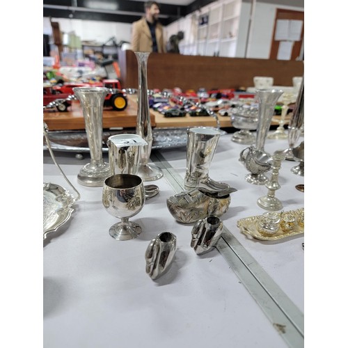 91 - Large quantity of plated ware inc a 4 person egg cup set with spoons, bud vases, cake knifes, sugar ... 