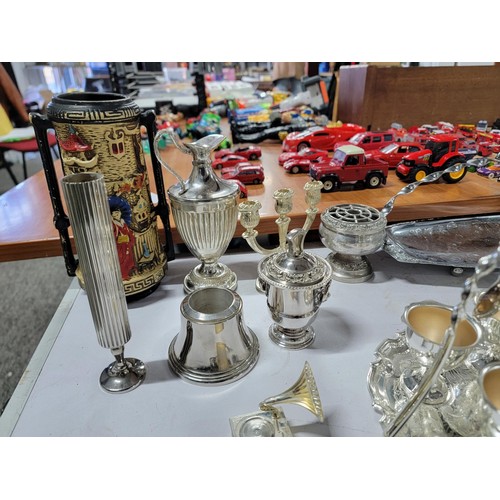 91 - Large quantity of plated ware inc a 4 person egg cup set with spoons, bud vases, cake knifes, sugar ... 