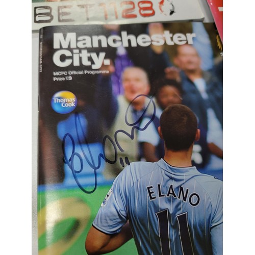 95 - A large quantity of football programmes for different clubs and internationals inc one signed by cov... 