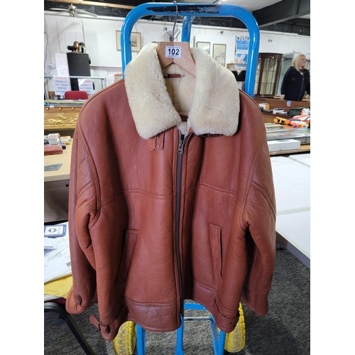 102 - Good quality real sheepskin coat wool lined and wool collar in good order size 44