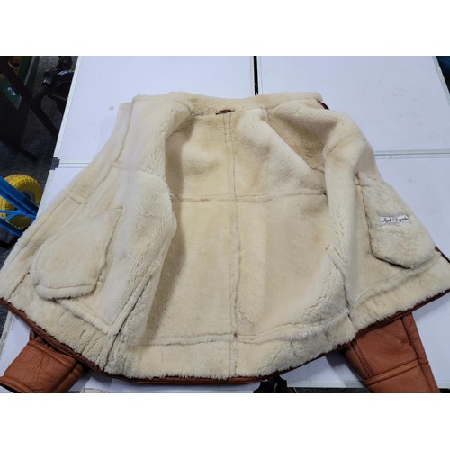 102 - Good quality real sheepskin coat wool lined and wool collar in good order size 44